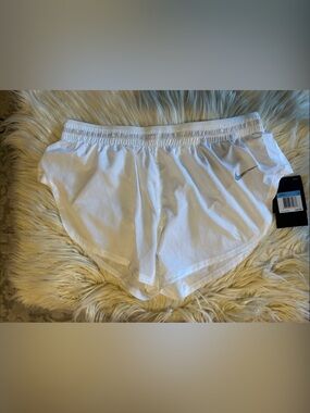 Nike White Athletic Running super high leg Shorts with Silver Swoosh